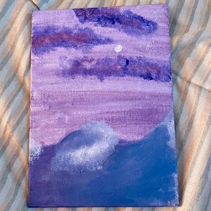 Ocean with wave and purple clouds